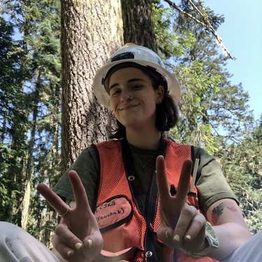 Amber in hard hat and field vest